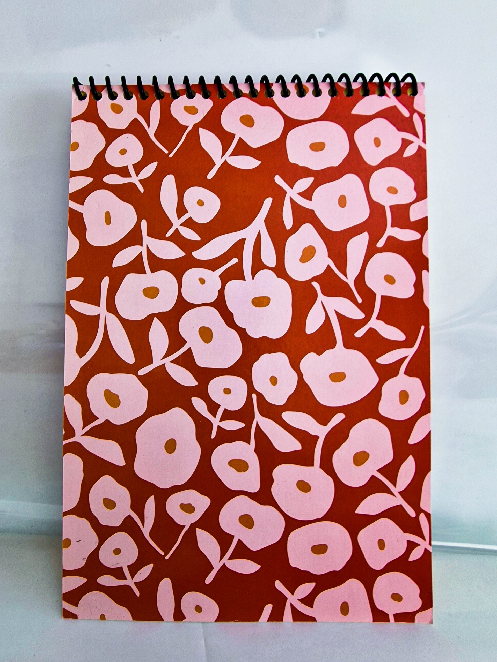 capa bloco laranja forte com flores